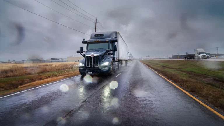 Aurora Driver autonomous Class 8 truck on a U.S. highway.
