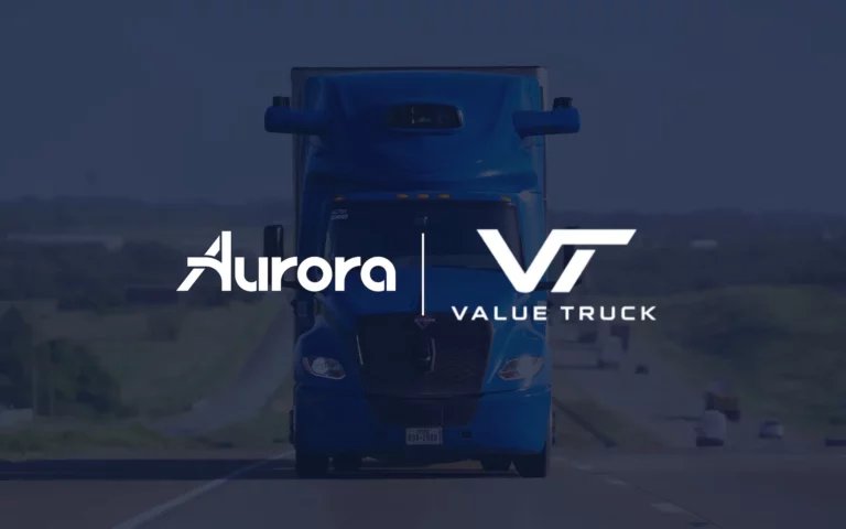 Aurora and Value Truck logos marking the agreement to deploy Aurora driverless trucks on Dallas-Laredo and Fort Worth-Phoenix freight routes