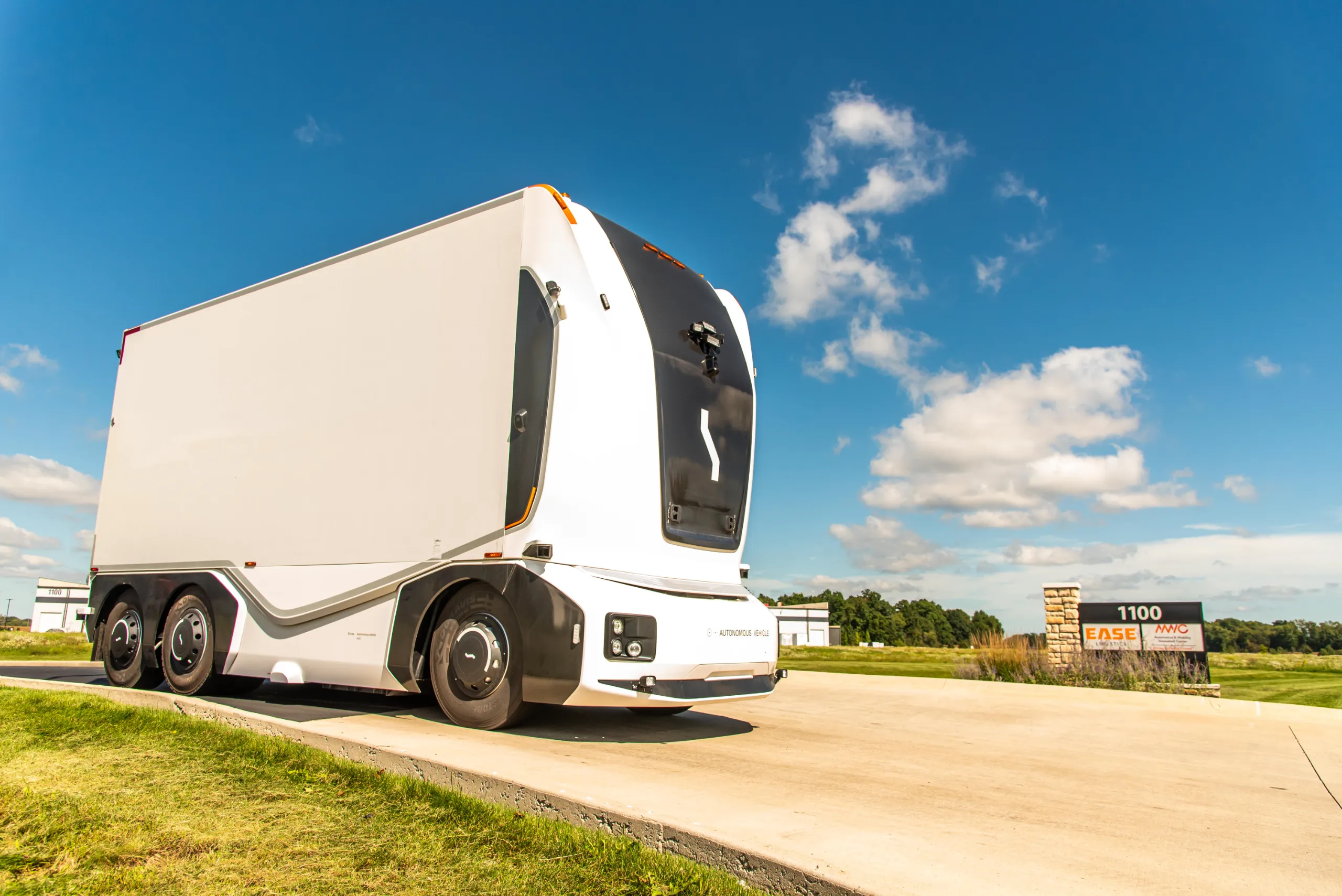 Einride autonomous trucks, cab-less and electric, moving freight between EASE Logistics warehouses in Marysville, Ohio.